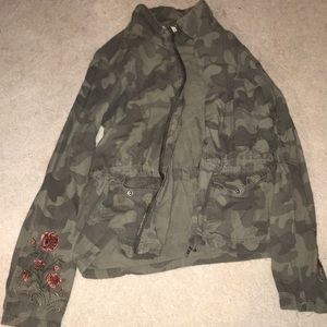 Green camo jacket with roses on the sleeve